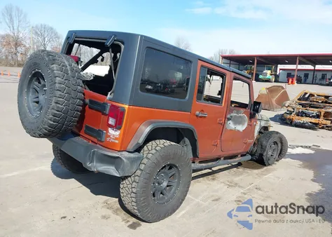 2011 Jeep Wrangler Unlimited Rubicon z USA, uszkodzony, nr VIN 1J4BA6H19BL507576